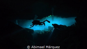 Evelio and Eduardo Exploring Cenote by Abimael Márquez 